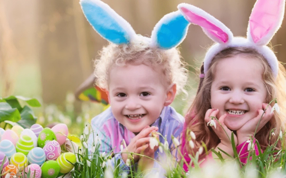 Two Happy Toddlers Girls Lying On Grass With Bunny Ears Hairbands