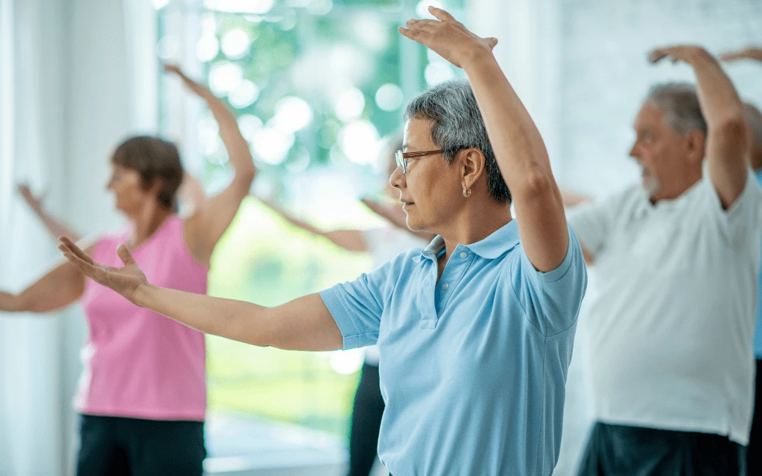 Group Of Elderly Doing Tai Chi exercise
